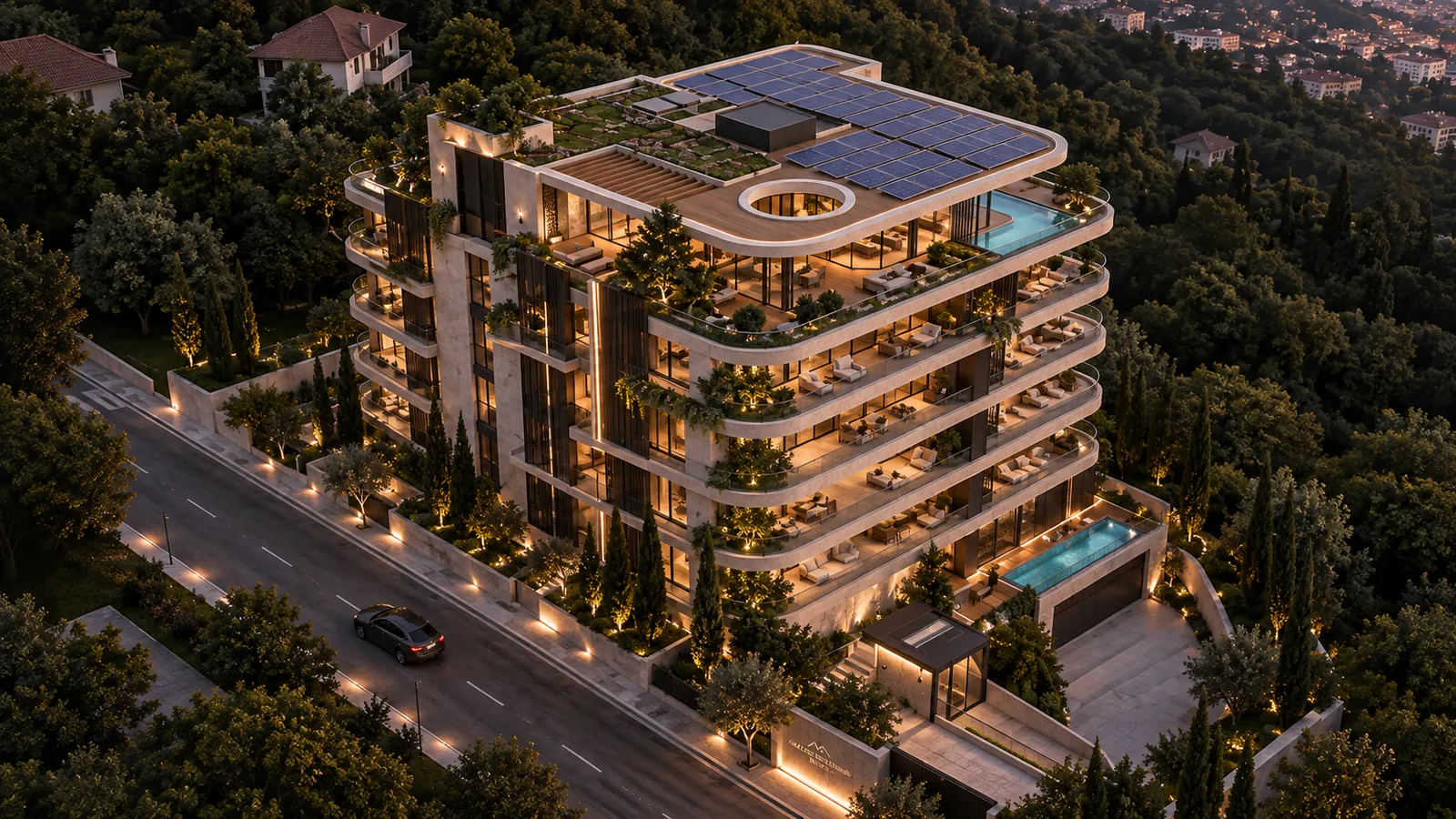 Aerial view of Kaklebi Residence at dusk: curved planted terraces, rooftop solar array and pools, set in forest above the street